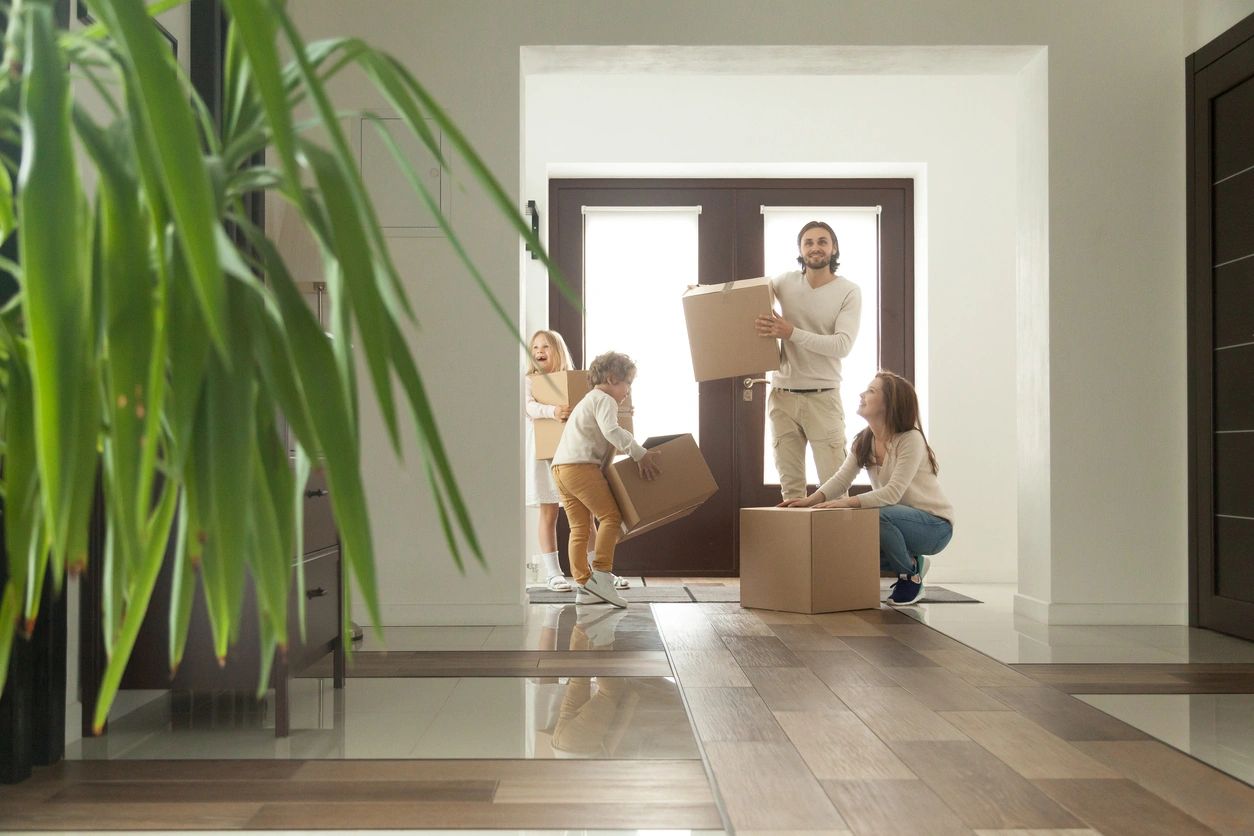 A family moving into their new home.